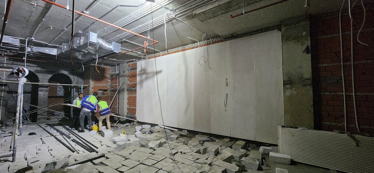 Before: Polysh during fit-out: installing walls and services