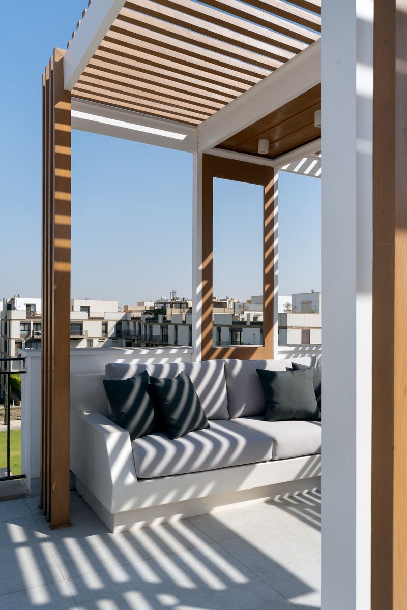 Sodic rooftop lounge under the pitch pine pergola