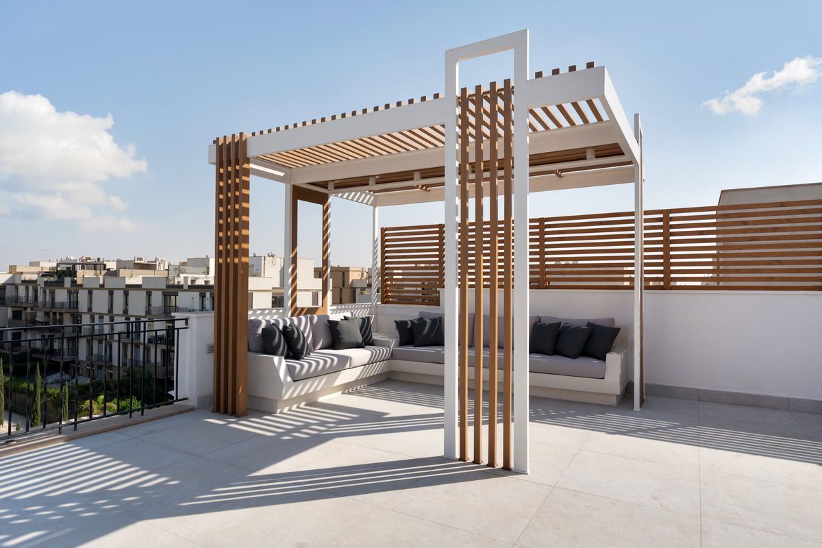 Sodic rooftop: pitch pine pergola over a built-in lounge